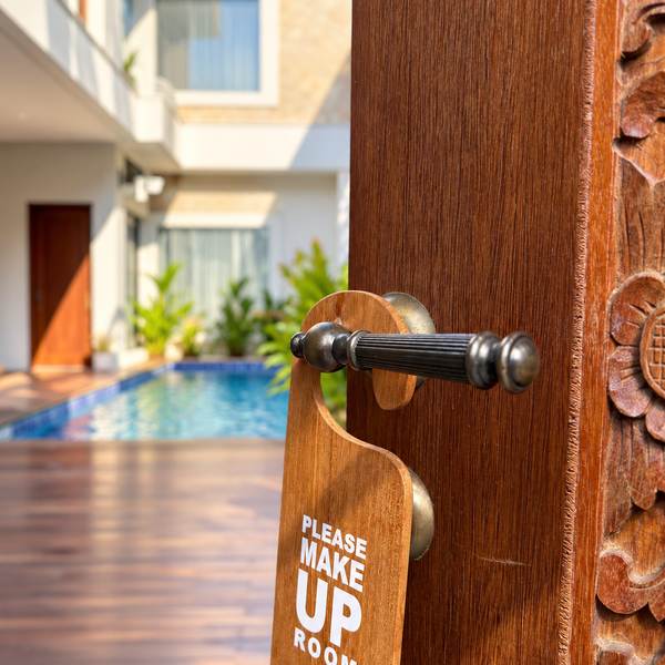 Timber door opening onto the pool deck